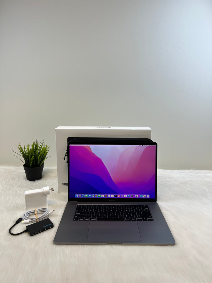 2019 MacBook Pro 16-Inch (2TB SSD, 64GB RAM, 8-Core Core i9) w/ 6 Months Warranty & Accessories